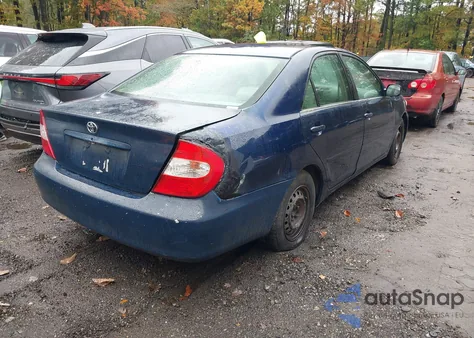 2002 Toyota Camry Le z USA, uszkodzony, nr VIN 4T1BE32K92U578261